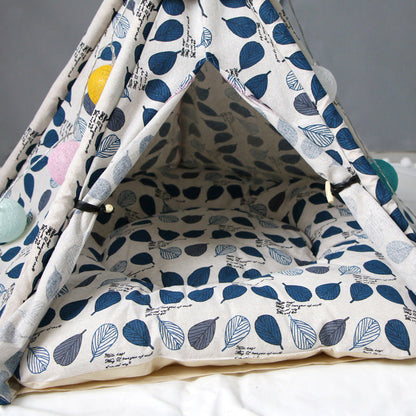 Dog kennel pet tent with blue leaf print fabric and cushioned interior on Tampa Home & Garden Store