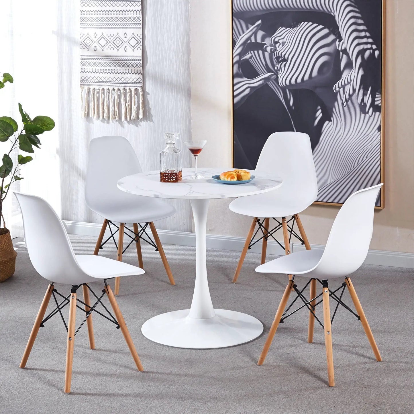 Tulip Special Dining Table with white marble top and white molded chairs on Tampa Home & Garden Store