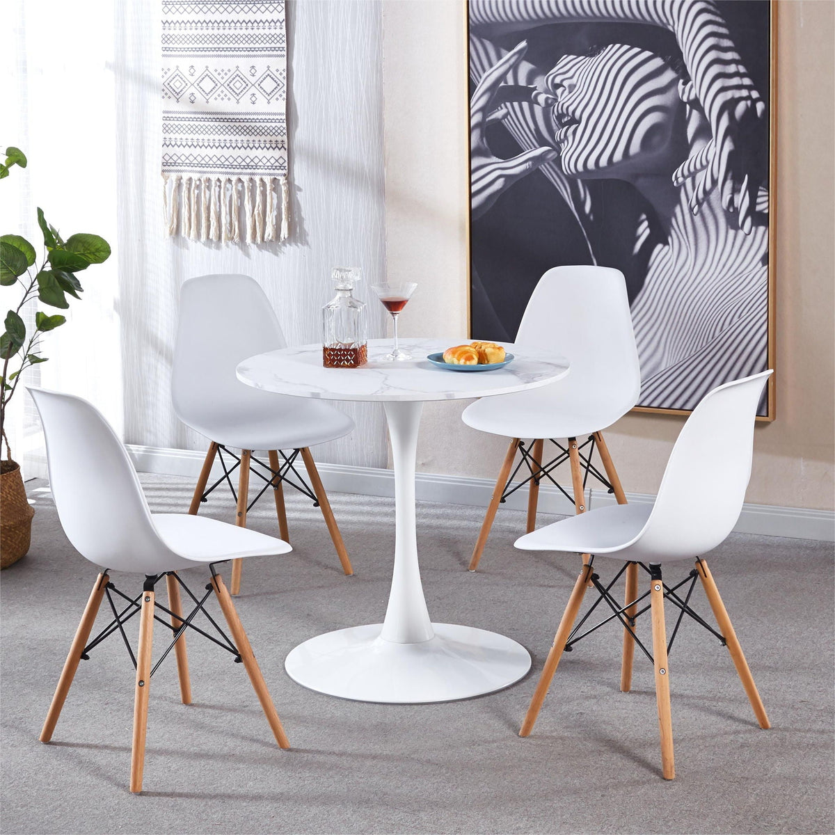 Tulip Special Dining Table with round white top and 4 white tulip chairs by HouseOfZazla on Tampa Home & Garden Store