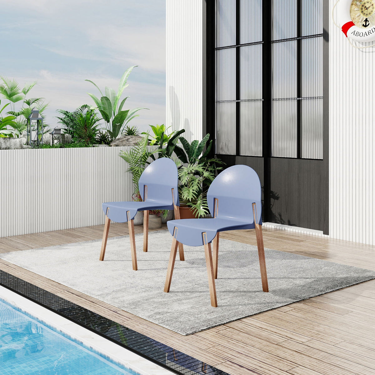 4 Piece Outdoor Chair Set with blue polypropylene seats and oak legs by pool deck on Tampa Home & Garden Store