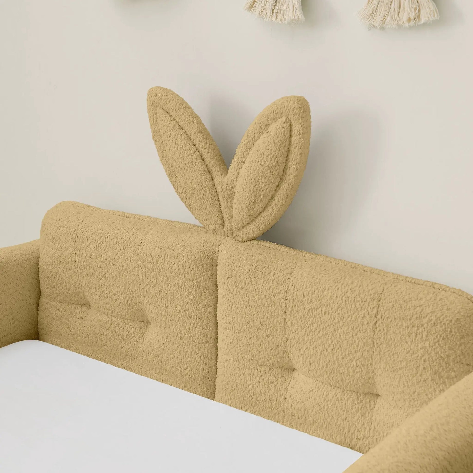 Cute Rabbit Ear upholstered platform bed frame with safety rail in beige boucle on Tampa Home & Garden Store