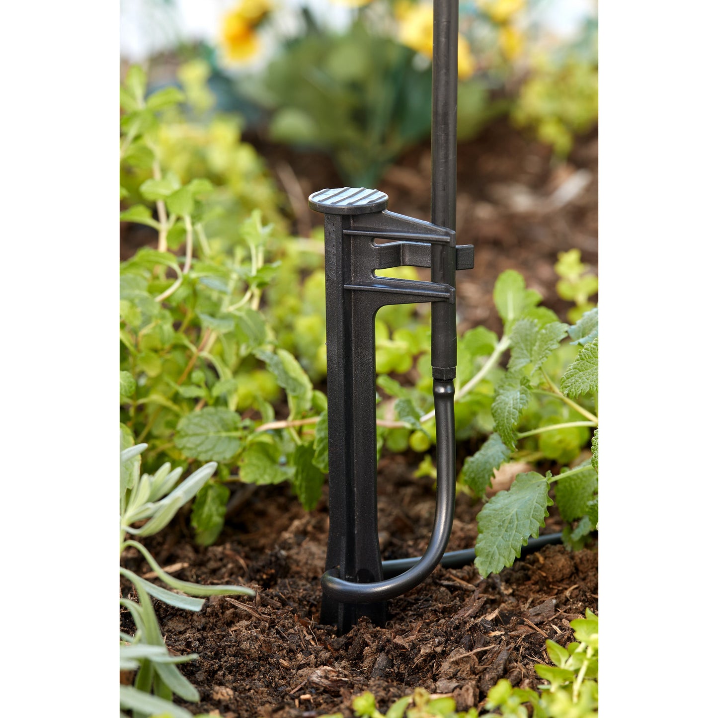 Drip blank distribution tubing stake, black plastic irrigation component on Tampa Home & Garden Store