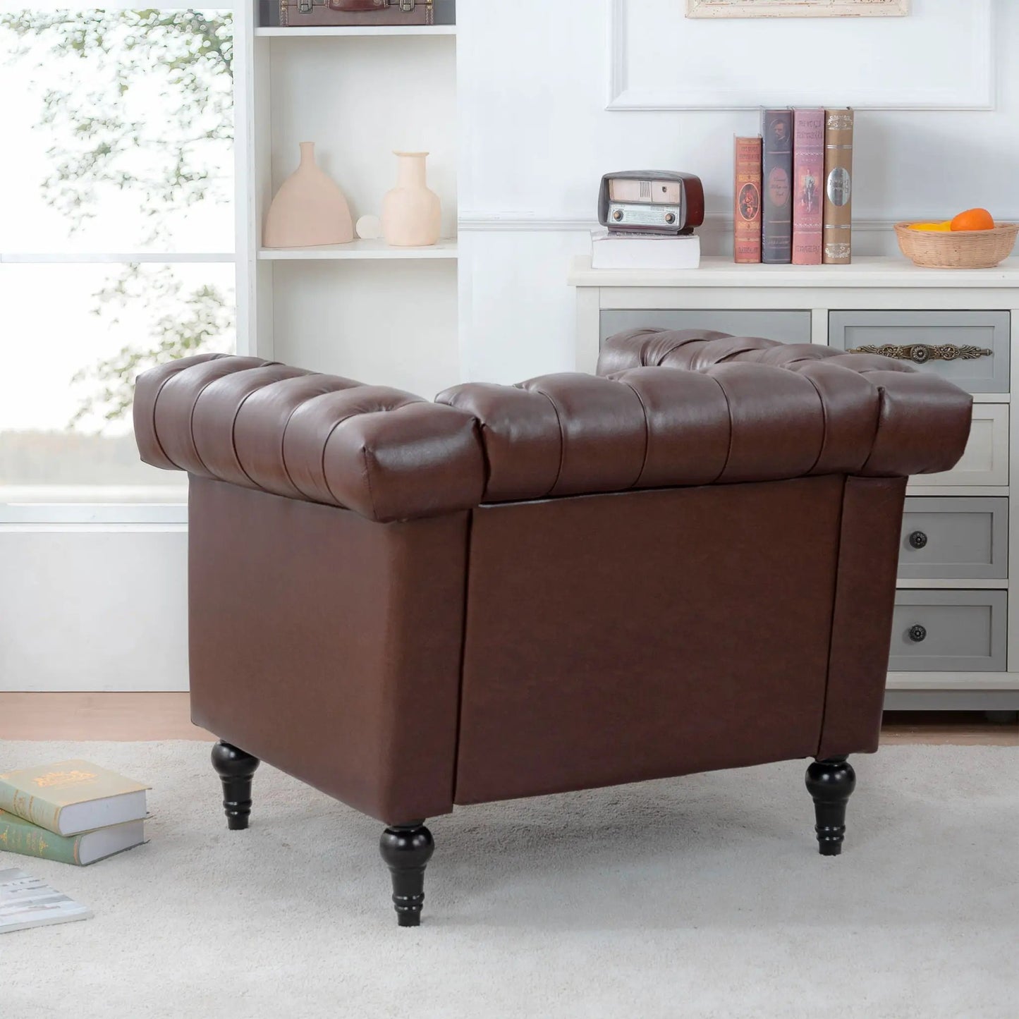 1 Seater brown leather tufted sofa with black turned legs on Tampa Home & Garden Store