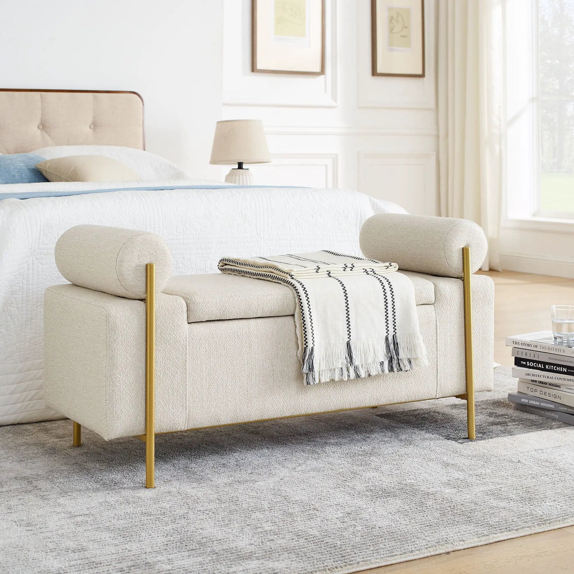 Elegant upholstered storage bench with cylindrical arms and iron gold legs in beige fabric on Tampa Home & Garden Store
