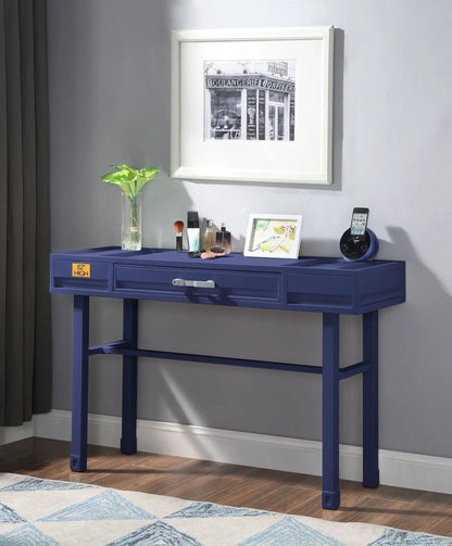 Cargo vanity desk with storage, makeup items, plant in glass vase, and framed art on Tampa Home & Garden Store