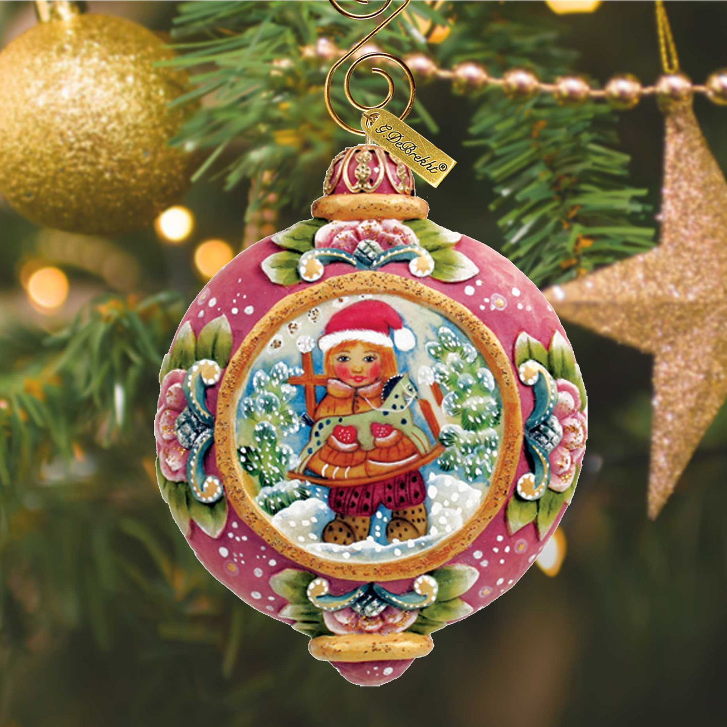 G. DeBrekht hand-painted sculpted ornament pink with gold trim and visible tag on crown on Tampa Home & Garden Store