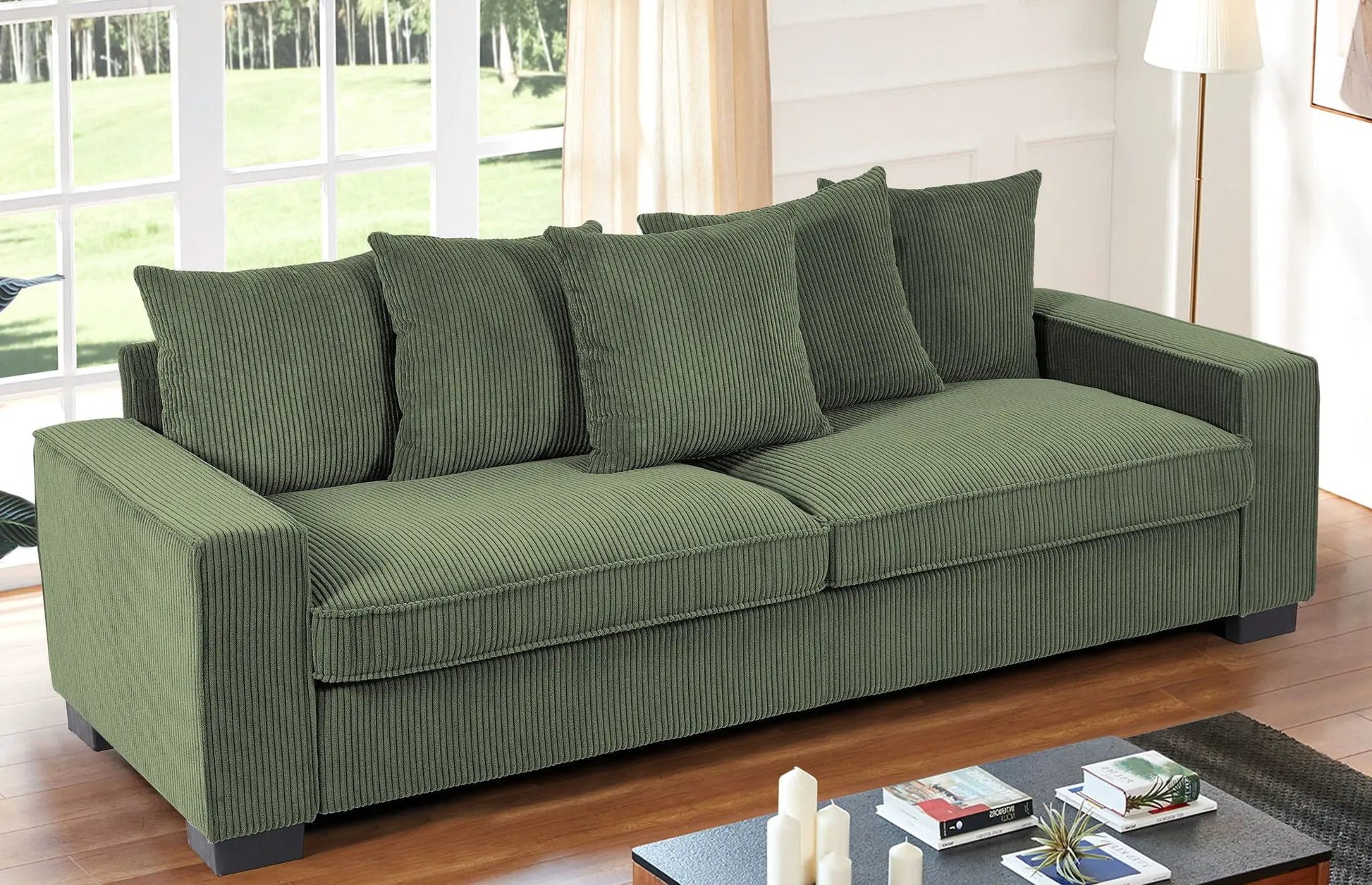 Green corduroy 3-seater stationary sofa with five matching toss pillows on Tampa Home & Garden Store