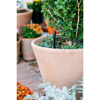 Drip irrigation kit Orbit Patio & Potted Plant Kit 67523 with black emitter in pot on Tampa Home & Garden Store