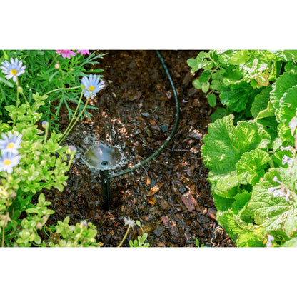 Patio & Potted Plant Kit 67523 drip system Orbit Irrigation with black tubing through garden on Tampa Home & Garden Store