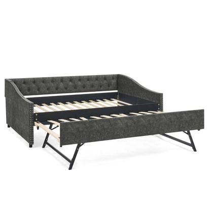 Upholstered daybed with pull-out trundle in gray fabric, tufted back and nailhead trim on Tampa Home & Garden Store