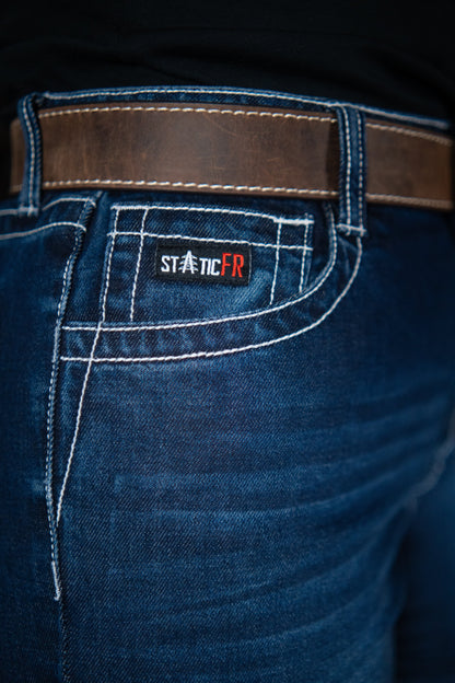 Women’s FR jeans denim with brown belt and Static FR patch on back pocket on Tampa Home & Garden Store