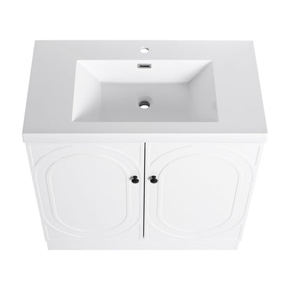 Freestanding white vanity with resin sink, two arched-panel doors and black knobs on Tampa Home & Garden Store