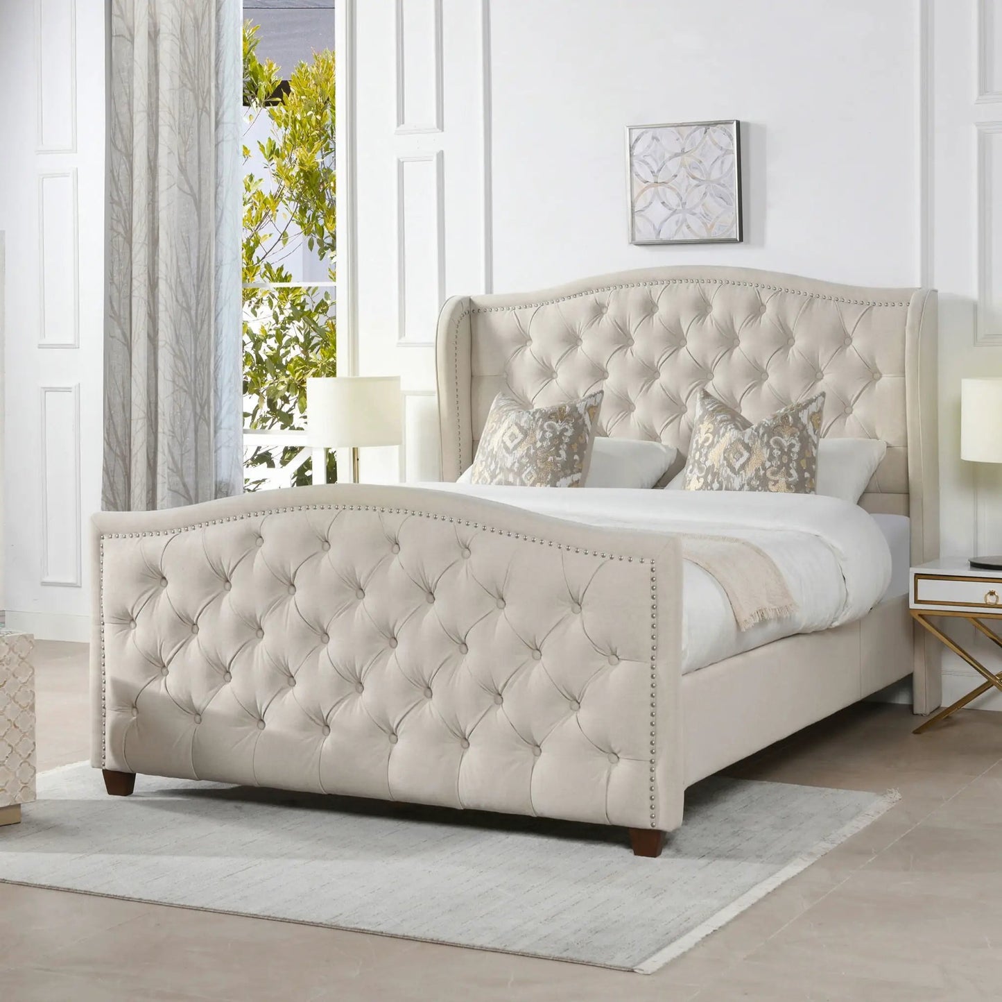Marcella upholstered shelter bed set by Unique Piece Furniture in beige tufted fabric with nailhead trim on Tampa Home & Garden Store