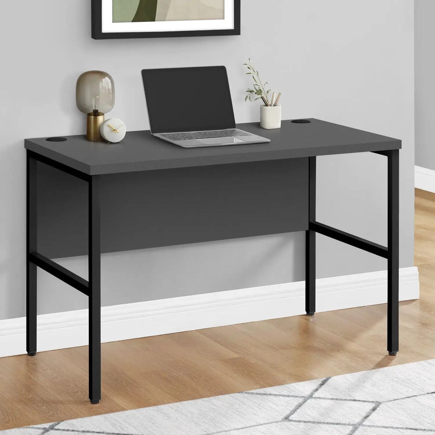 Computer Desk in dark gray with two cable grommets and black metal frame for modern home office on Tampa Home & Garden Store