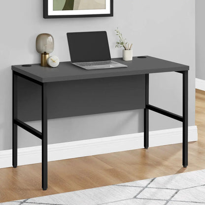 Computer Desk in dark gray with two cable grommets and black metal frame for modern home office on Tampa Home & Garden Store