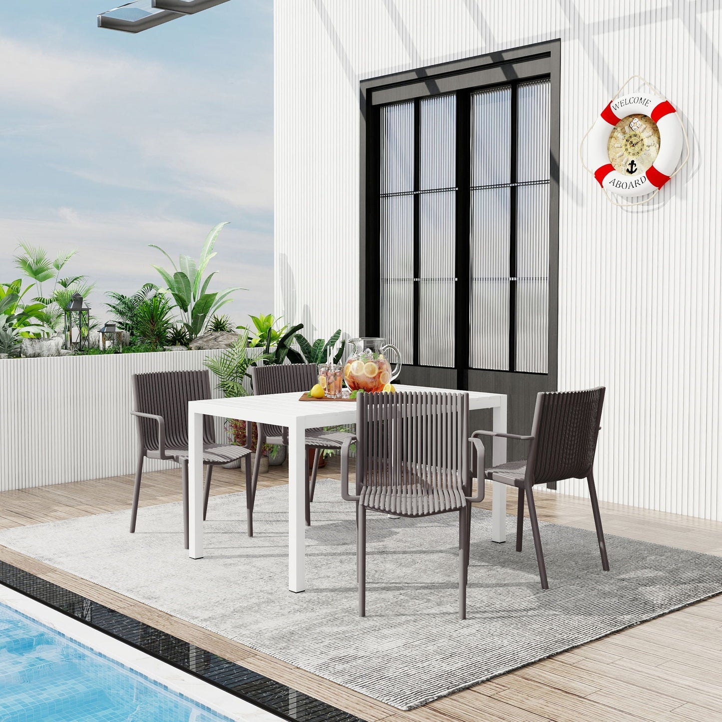4 Modern Stackable Armchairs and Long Table