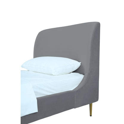 Mid-Century Modern upholstered bed with curved grey headboard and brass legs on Tampa Home & Garden Store