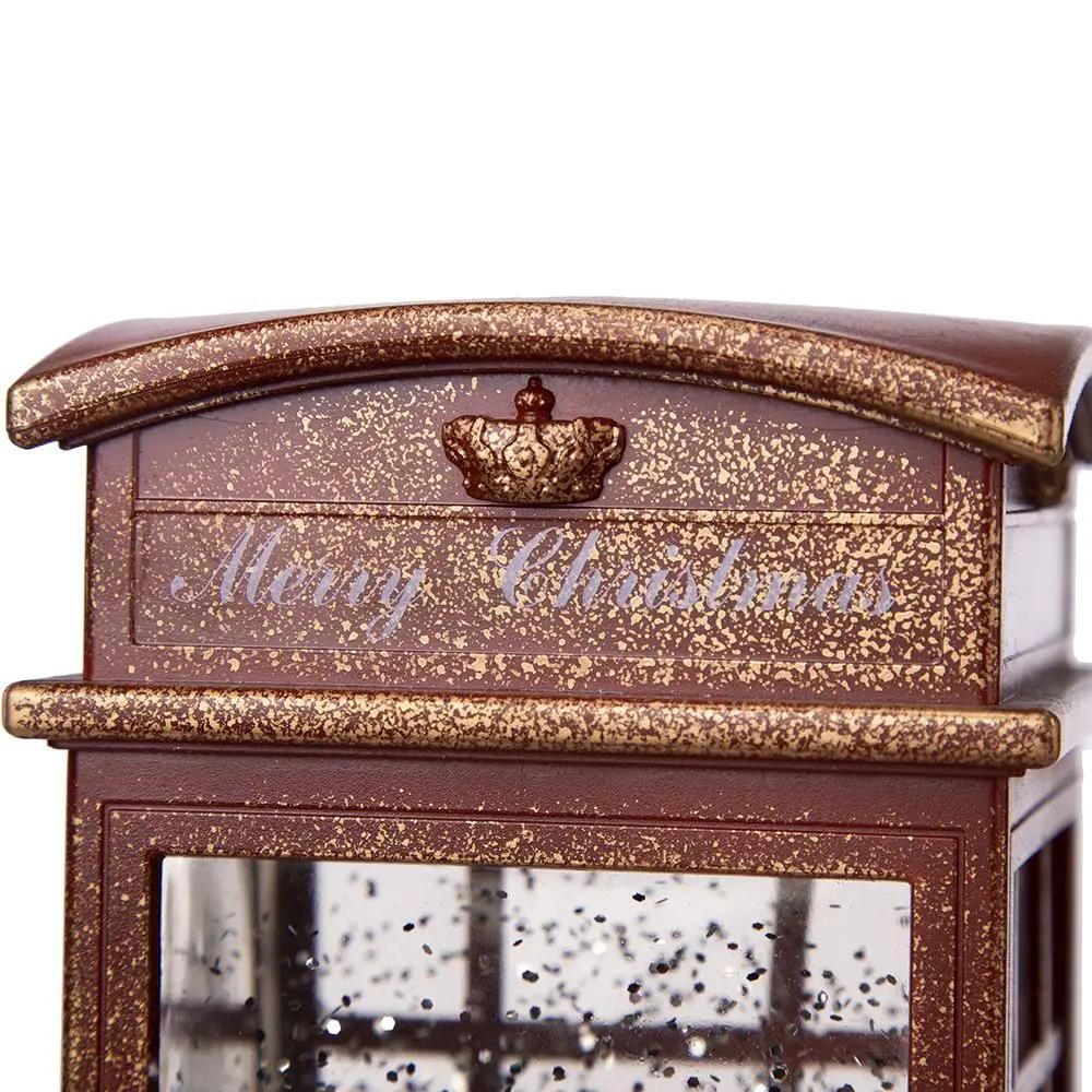 Christmas lantern with a vintage bronze finish, speckled gold trim, Merry Christmas script on Tampa Home & Garden Store