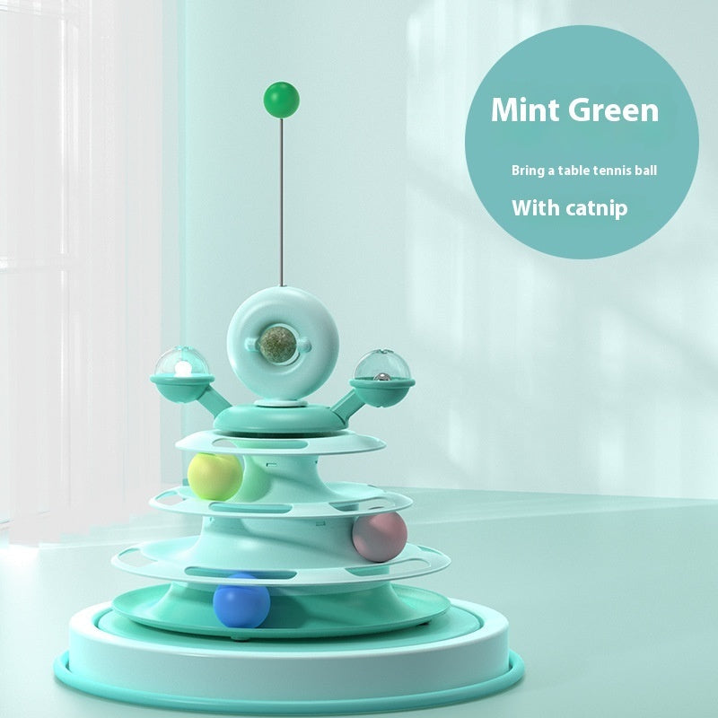 Mint green 4-level cat toy tower with rotating discs and colorful balls by Sell My Stuff on Tampa Home & Garden Store