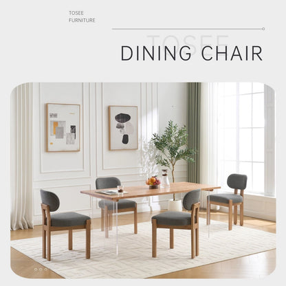 Dining chairs with ergonomic backrests and gray upholstered seats, six around a wooden dining table on Tampa Home & Garden Store