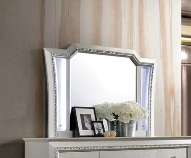 Kaitlyn LED vanity mirror with white frame and LED side panels on a dresser on Tampa Home & Garden Store