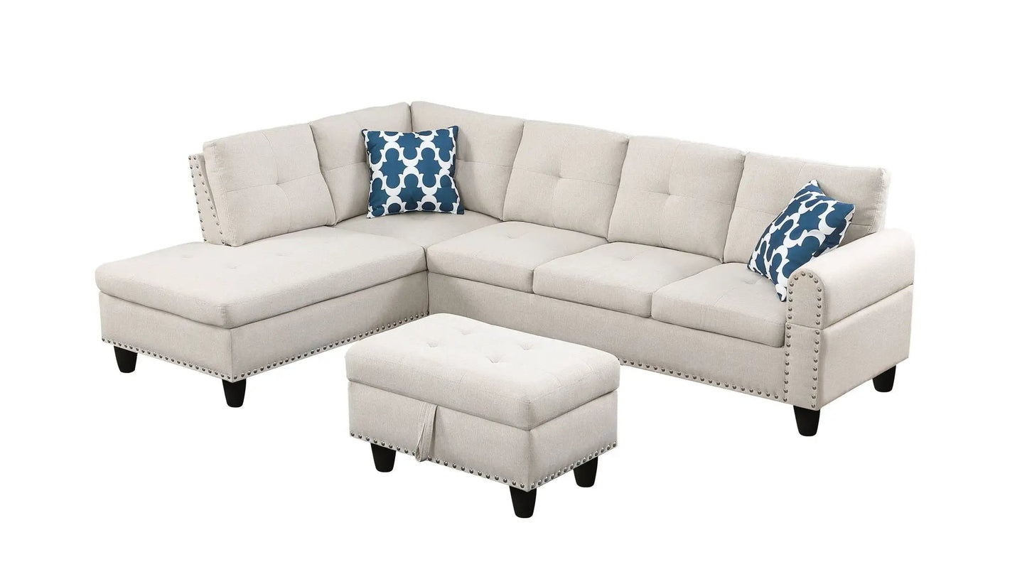 Beige left-hand facing sofa with chaise and ottoman; nailhead trim, patterned pillows on Tampa Home & Garden Store