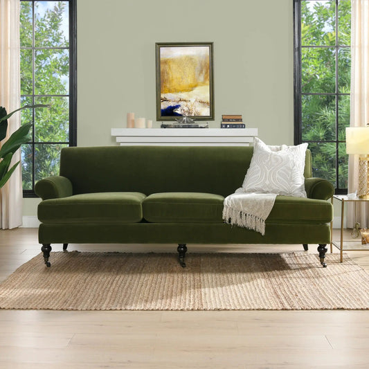 Alana Lawson three-cushion tightback sofa in deep green velvet with ottoman on Tampa Home & Garden Store