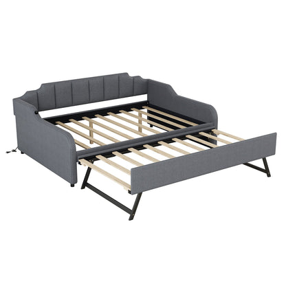 Full-size gray upholstered daybed with pull-out trundle and slatted wood bed base on Tampa Home & Garden Store