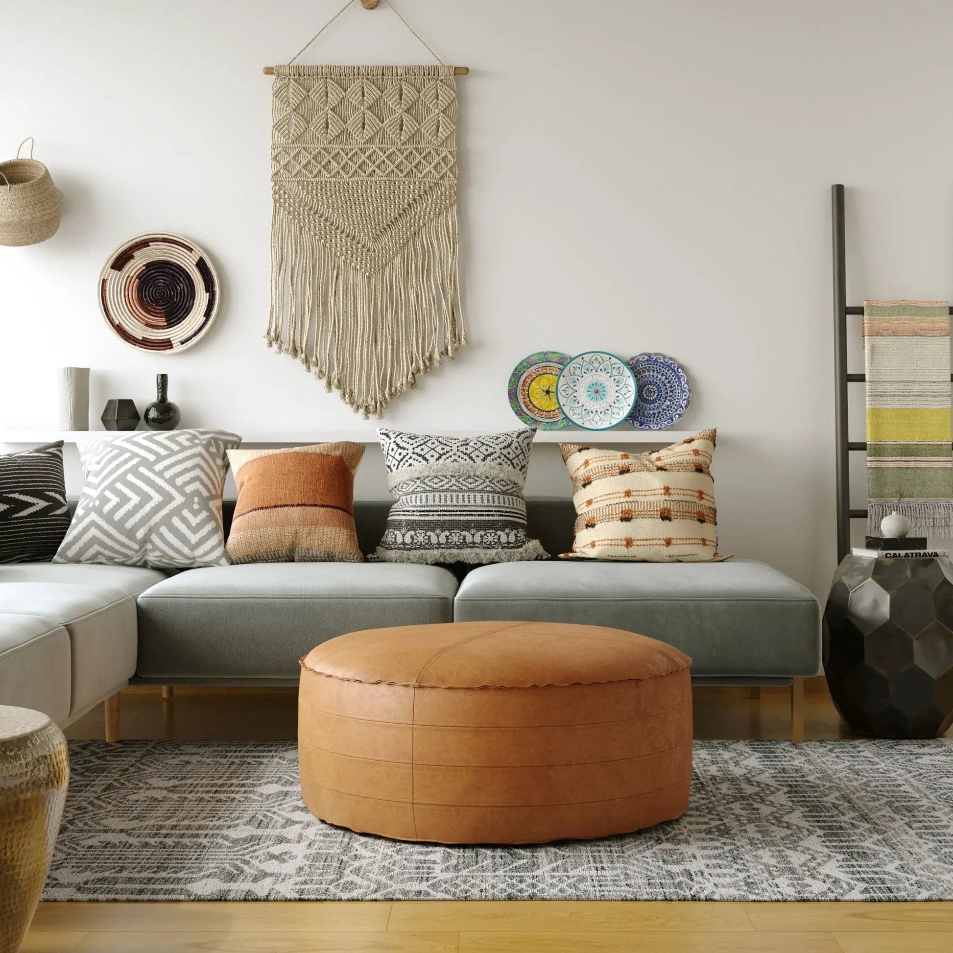 Brody round pouf by Unique Piece Furniture in tan leather with stitched panels on Tampa Home & Garden Store