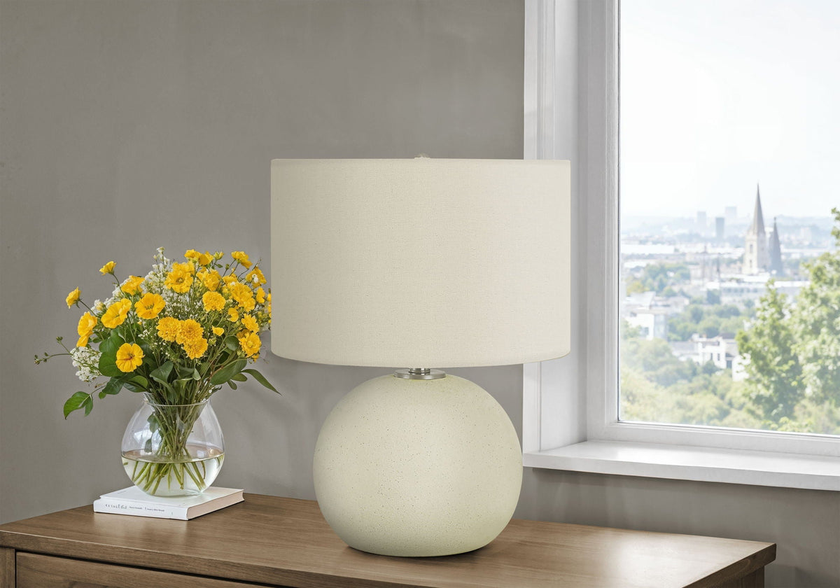 Contemporary cream ceramic table lamp with two-sphere base and fabric shade on Tampa Home & Garden Store