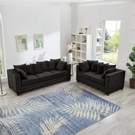 Modern Design Sofa 2+3 Seater by HouseOfZazla in black faux leather with nailhead trim on Tampa Home & Garden Store
