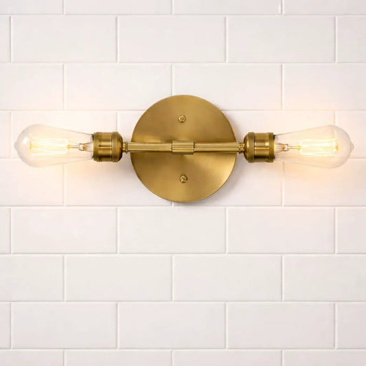 Reverie double lights bathroom wall sconce in brass gold with clear glass Edison bulbs on Tampa Home & Garden Store