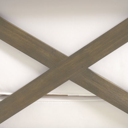 Wooden X-brace frame with brown slats on white textured fabric backdrop on Tampa Home & Garden Store