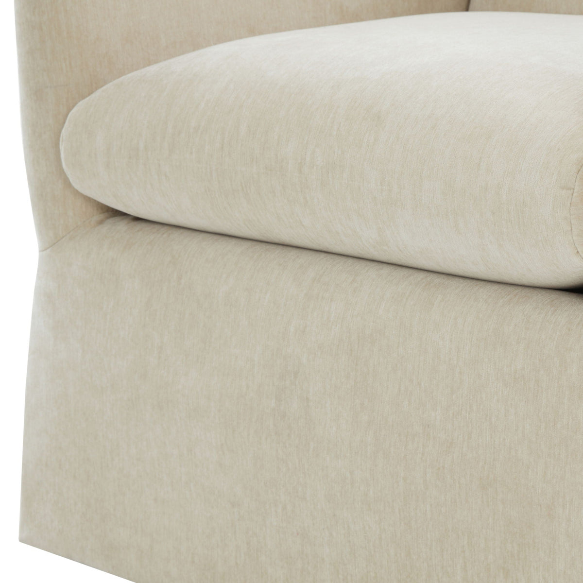 Skirted swivel accent chair beige upholstery close-up of curved arm on Tampa Home & Garden Store