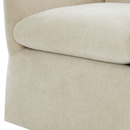 Skirted swivel accent chair beige upholstery close-up of curved arm on Tampa Home & Garden Store