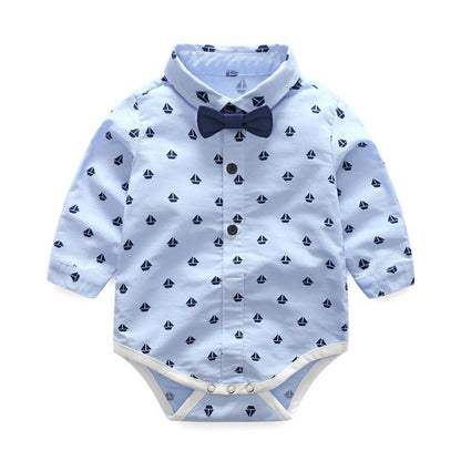 Baby boys bow-tie romper set by Stevvex in light blue with navy sailboat print, sleeves on Tampa Home & Garden Store