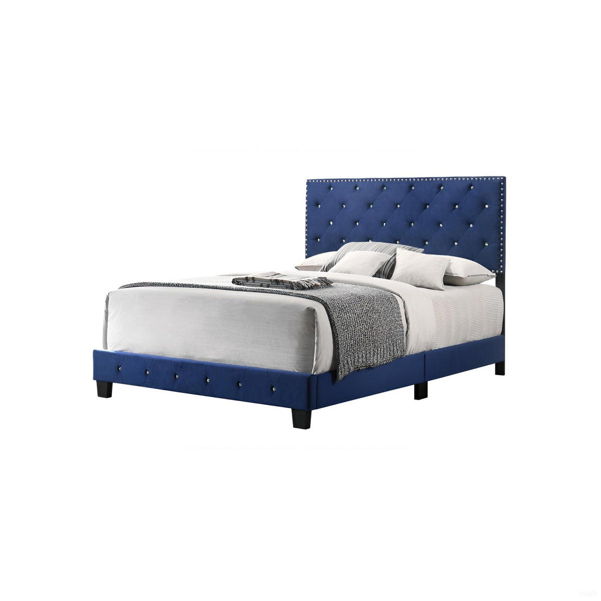 Luxurious blue upholstered bed with tufted headboard and nailhead trim by HouseOfZazla on Tampa Home & Garden Store