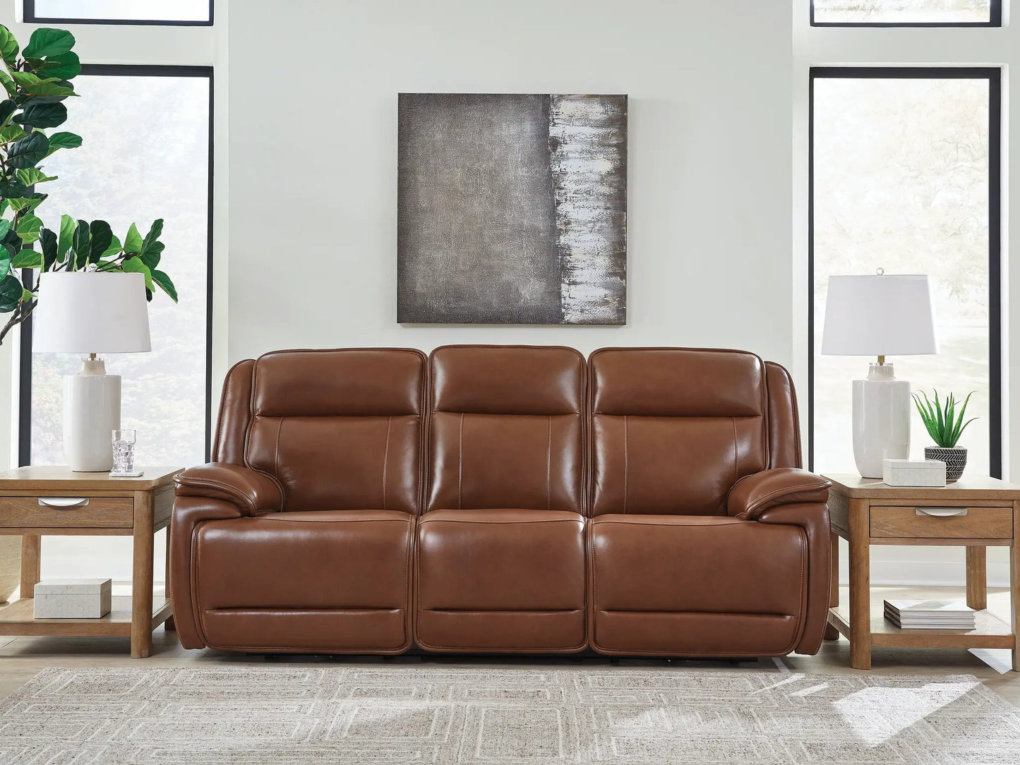 Healy Pier power reclining sofa with adjustable headrests in chocolate leather on Tampa Home & Garden Store