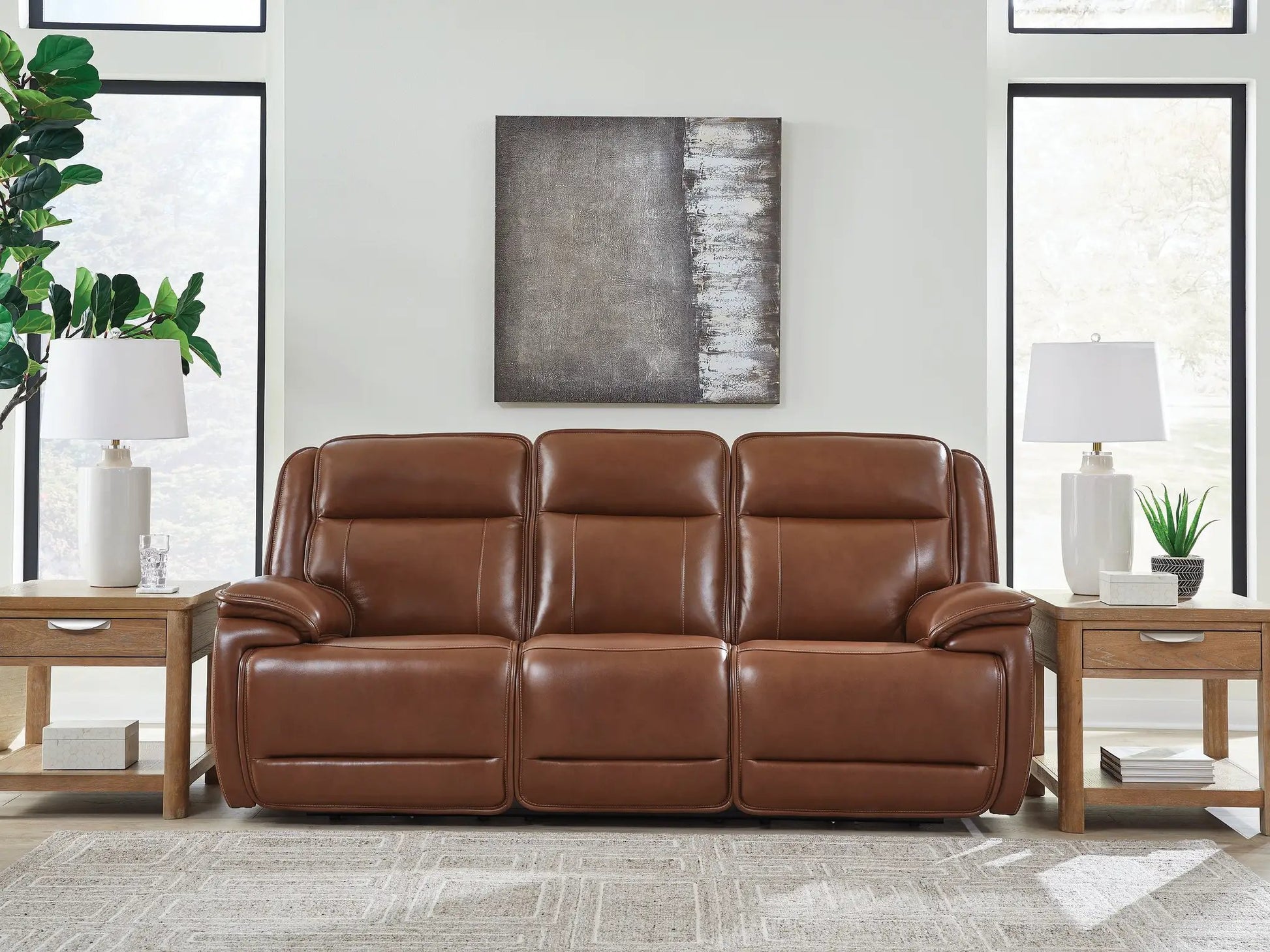 Healy Pier power reclining sofa with adjustable headrests in chocolate leather on Tampa Home & Garden Store