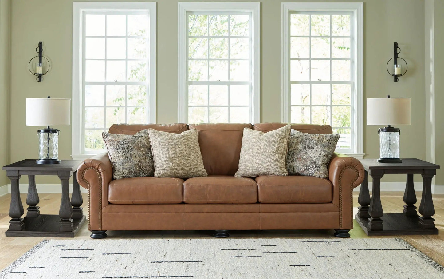 Carianna sofa caramel leather, stationary with rolled arms and cushions on Tampa Home & Garden Store