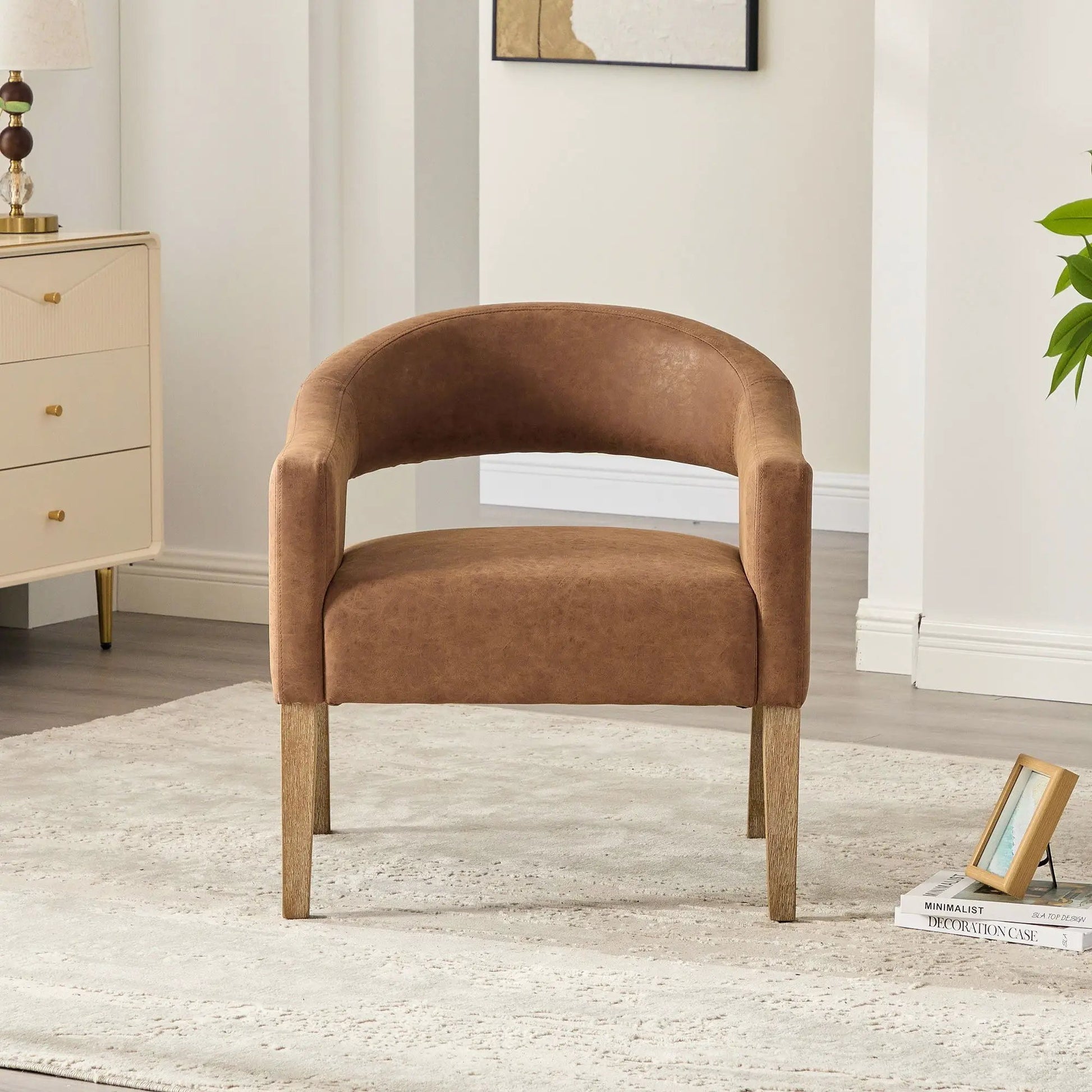 Upholstered open-back armchair with weathered rubberwood legs in warm brown fabric on Tampa Home & Garden Store