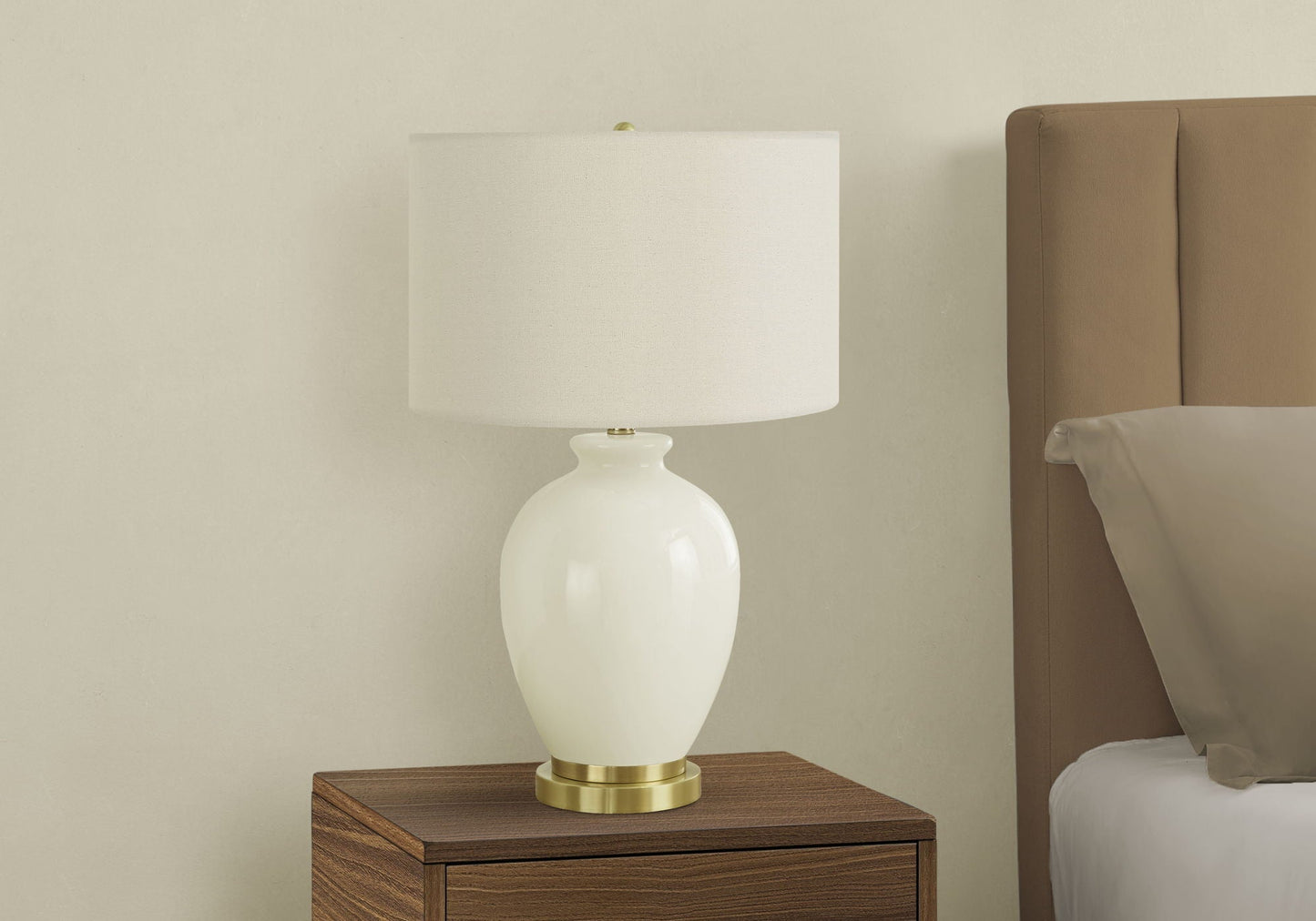 Transitional Table Lamp - Cream with white ceramic base and brass accents on a nightstand on Tampa Home & Garden Store