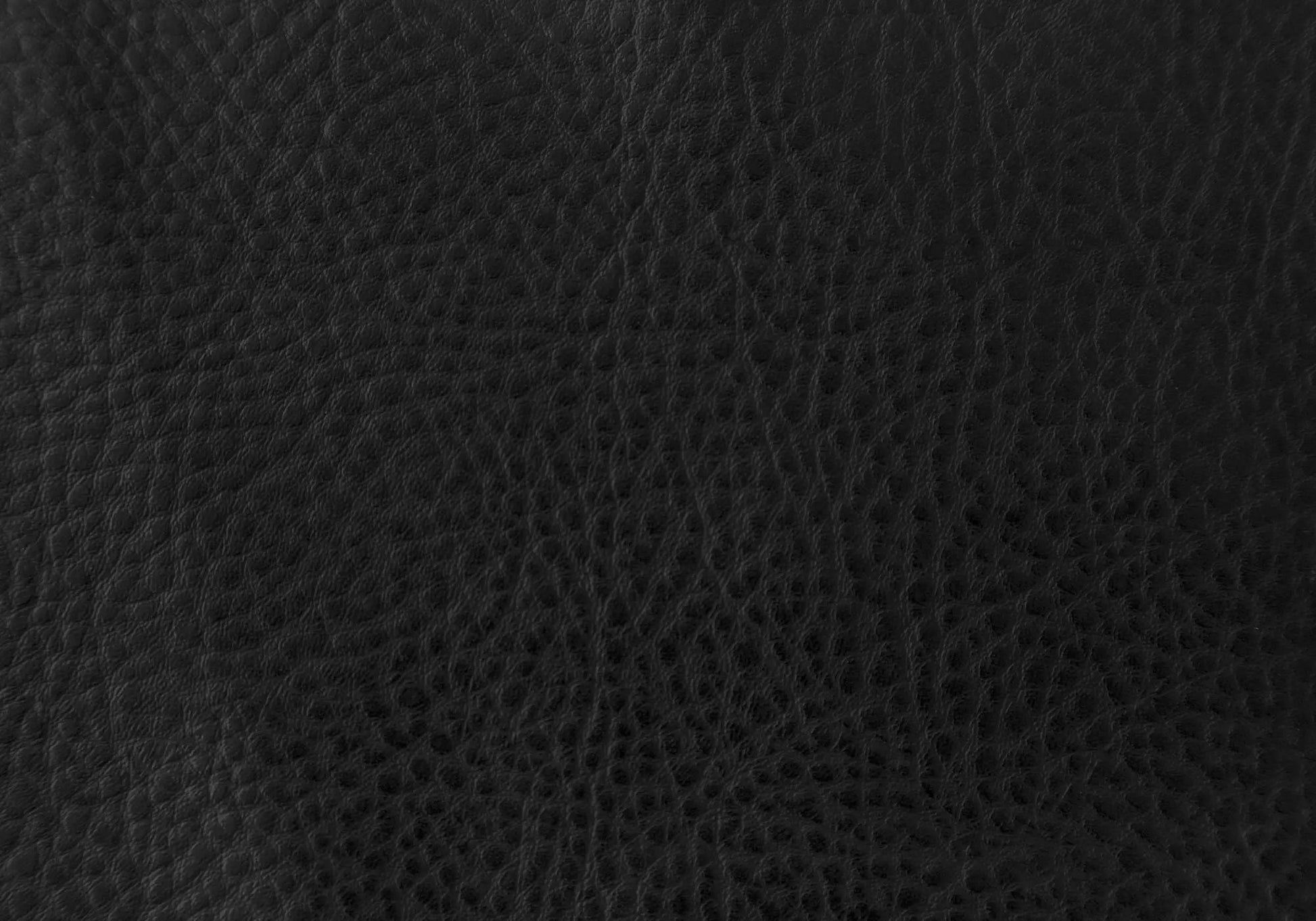Swivel stool set backdrop in black pebbled leather texture on Tampa Home & Garden Store