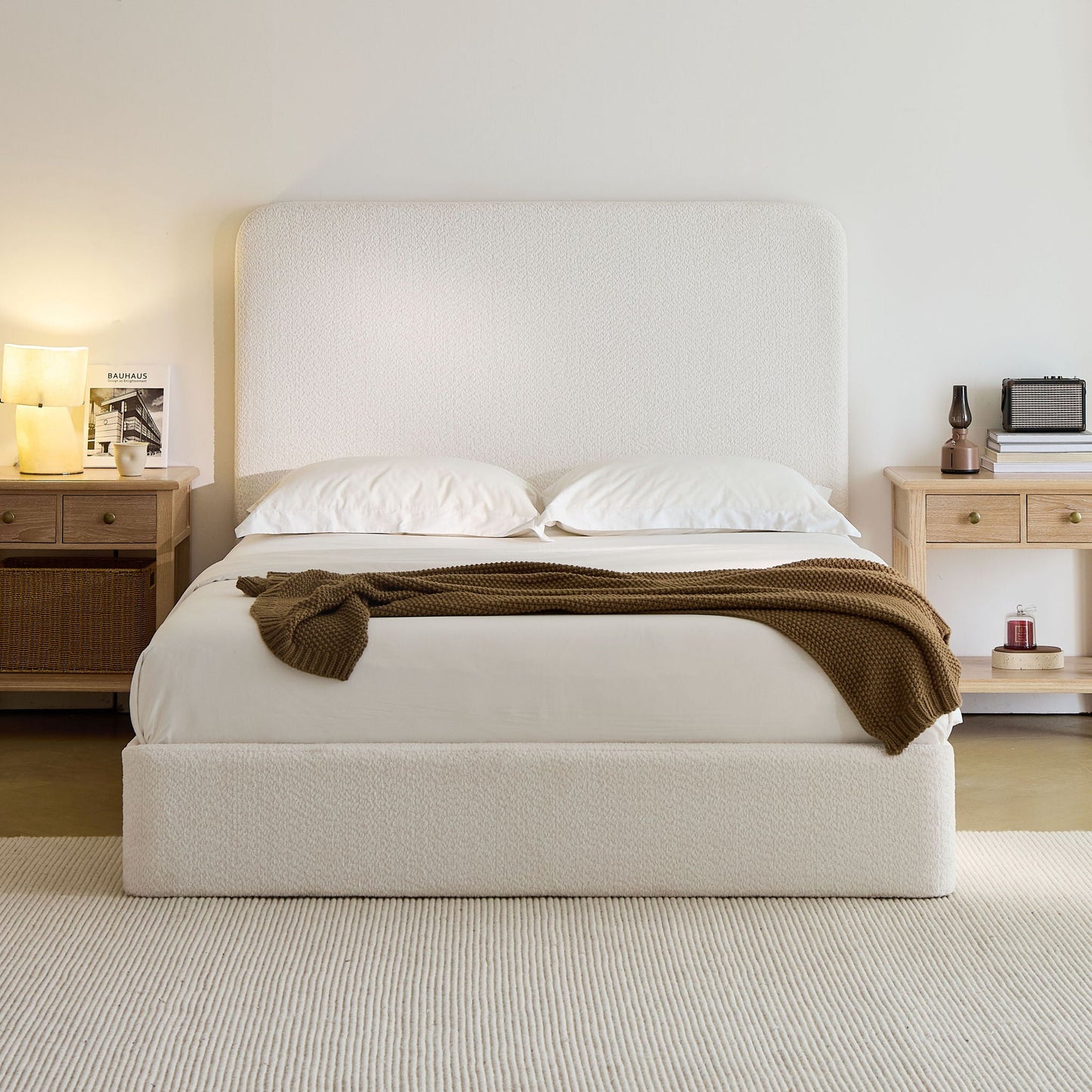 Canter tall headboard upholstered bed in cream boucle with twin nightstands and knit throw on Tampa Home & Garden Store