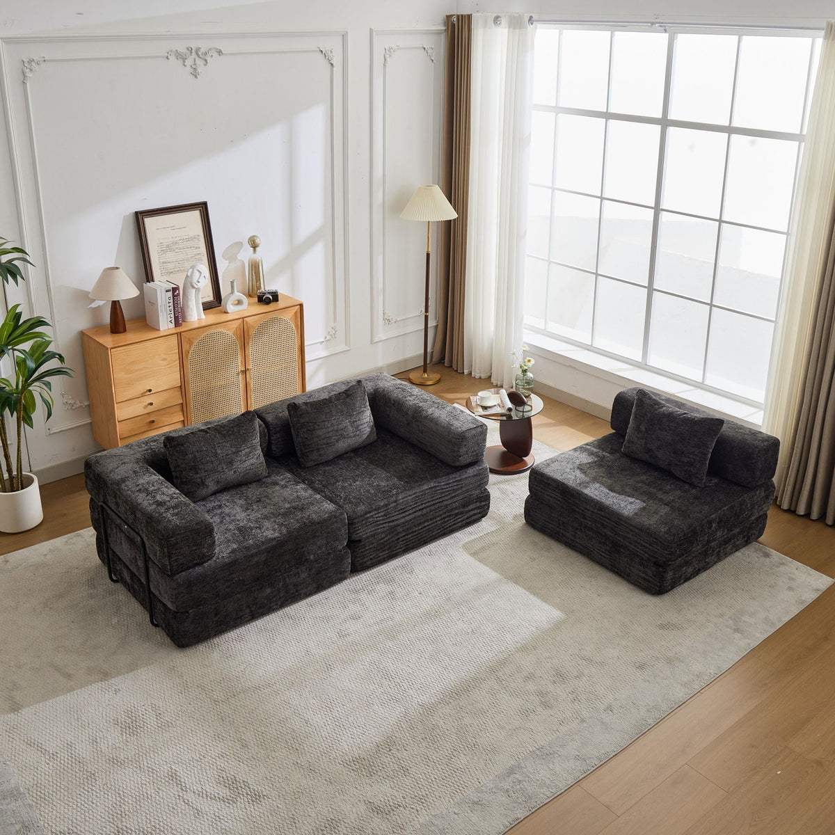 Convertible floor sofa bed boneless modular sectional in dark charcoal gray living room on Tampa Home & Garden Store