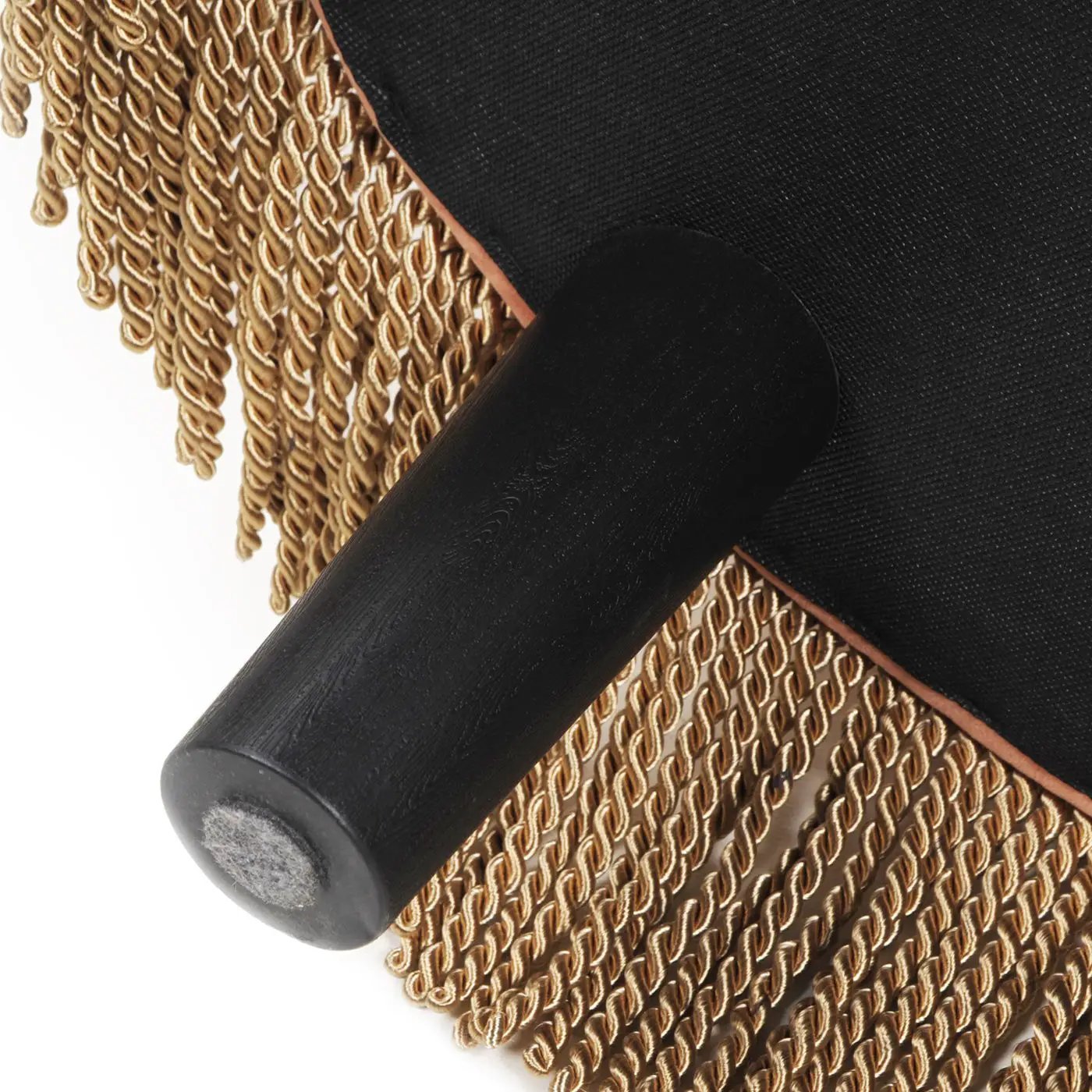 Yolanda round upholstered ottoman: black fabric, tan fringe trim, black wood leg with felt pad on Tampa Home & Garden Store