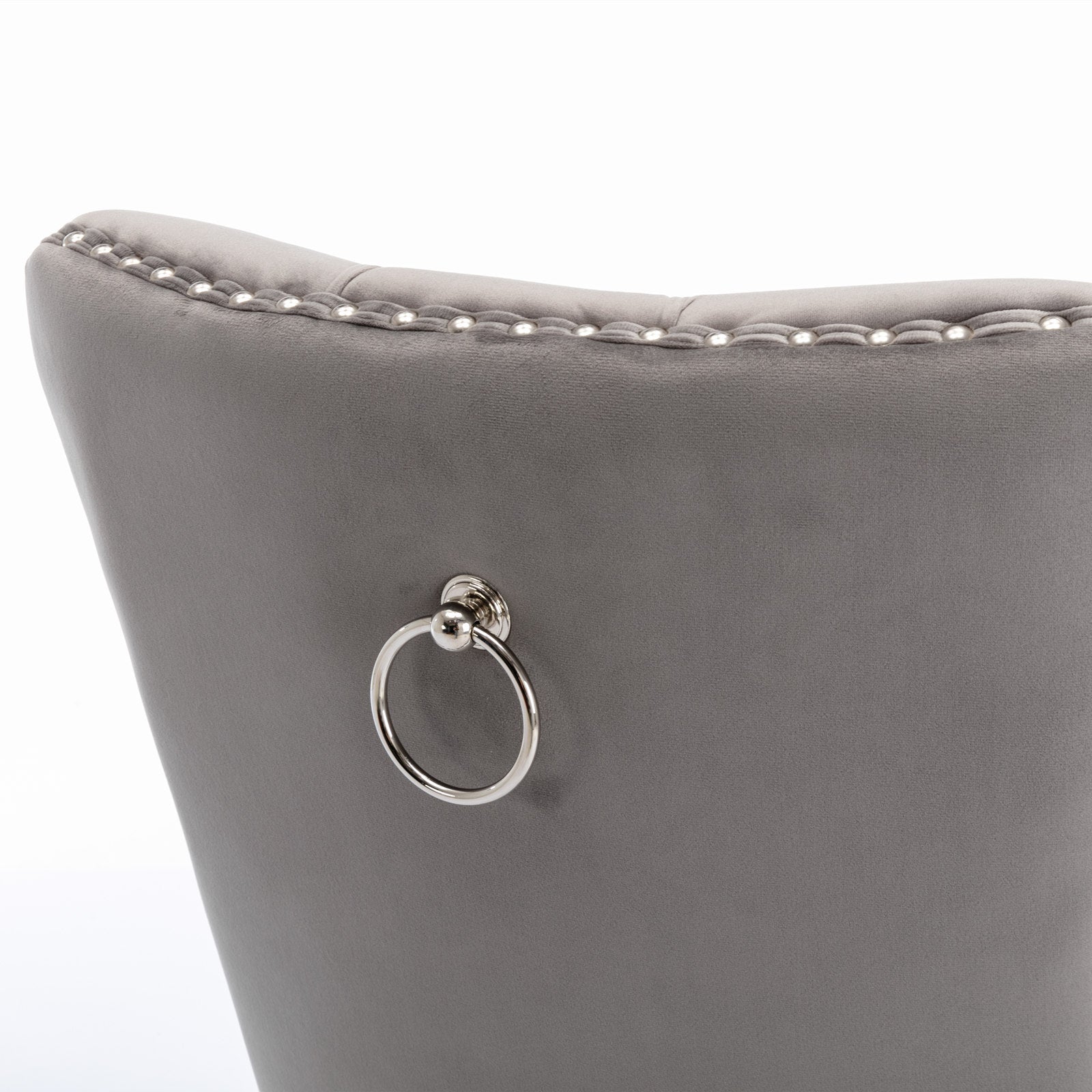 Nikki Collection gray velvet dining chair back with nailhead trim and metal ring pull on Tampa Home & Garden Store