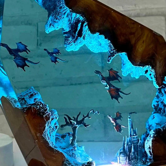 Fire Dragon and Ice Dragon resin desk lamp with blue glow, wooden frame and multiple dragon figures on Tampa Home & Garden Store