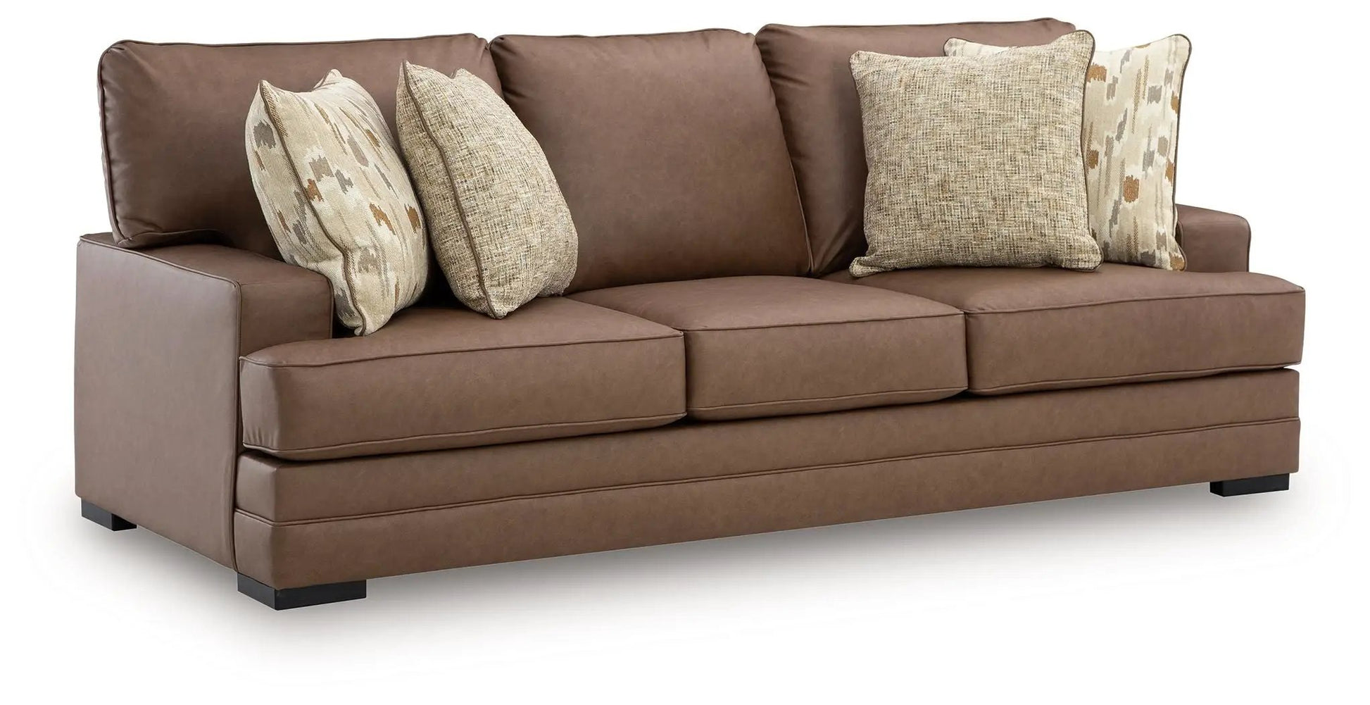 VillaCourt sofa caramel brown leather, stationary 3-seat with beige pillows on Tampa Home & Garden Store