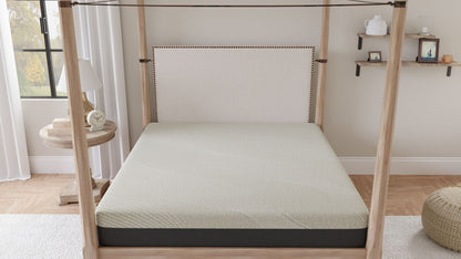 12in Comfort Series memory foam mattress on a light wood canopy bed with beige headboard on Tampa Home & Garden Store
